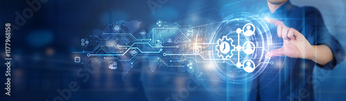 Businessman hold Enterprise Resource Planning (ERP) network connecting icon for streamlining business operations, improving efficiency, and integrating various processes into a unified solution.