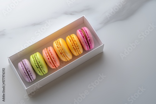 French Delicacy: A Selection of Colorful Macarons in a Stylish Box.
