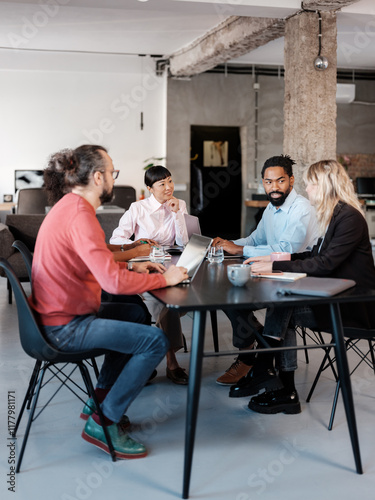 Diverse Team Collaborating in a Modern Office Space photo