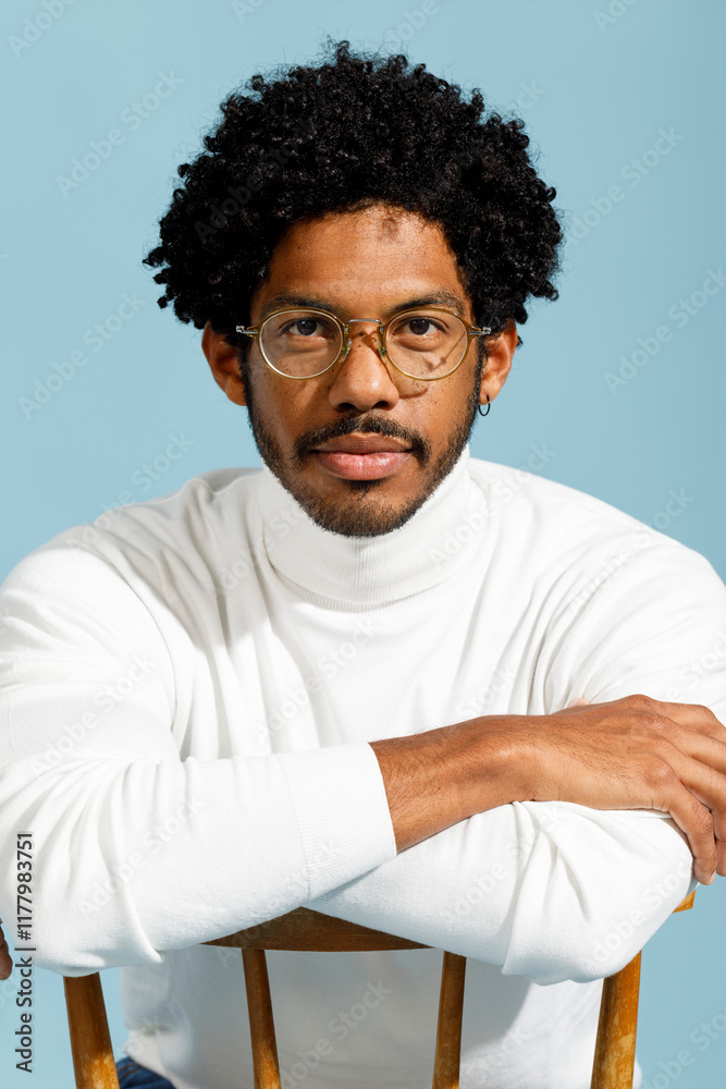 Man against light blue background Man against light blue background