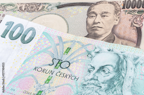 Japanse 10000 yen and Czech 100 korona banknotes. International trade concept photo