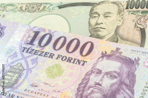 Wallpaper Mural Japanse 10000 yen and Hungarian 10000 forint banknotes. International trade concept Torontodigital.ca