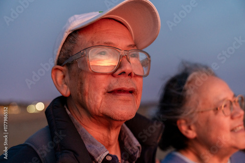 Content faces watching sunset photo