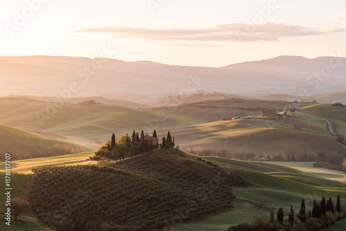 Sunrise over the rolling hills of Val D'Orcia, Tuscany, Italy.