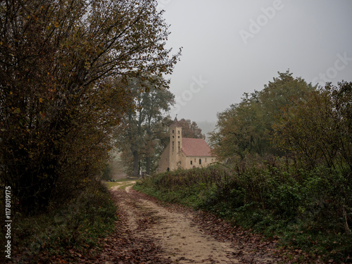 Abandoned church in forest photo