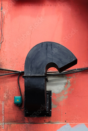 Black Vent on Red Wall photo