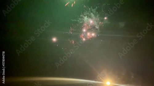 UFO? No -fireworks in the night sky.