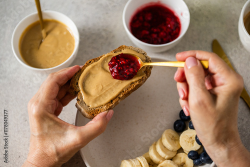 Peanut butter raspberry jam toast for breakfast