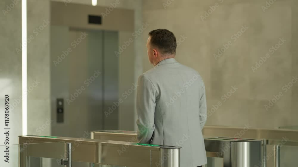 Businessman in modern office environment. Concept of businessman in office. Businessman in modern office environment. Concept of businessman in office.
