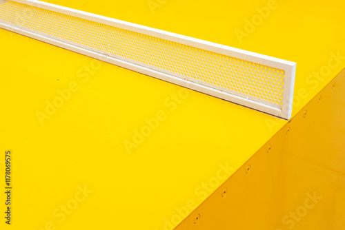 Close-up of modern minimal colourful yellow sport ping pong table 