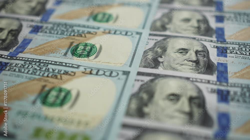 Close-up of Macro shot of US hundred-dollar bills arranged in neat rows, focusing on Benjamin Franklin's portrait. High detail emphasizes financial concepts, wealth, and currency Close-up of Macro shot of US hundred-dollar bills arranged in neat rows, focusing on Benjamin Franklin's portrait. High detail emphasizes financial concepts, wealth, and currency