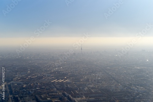 Berlin Skylines with the TV Tower veiled in haze photo