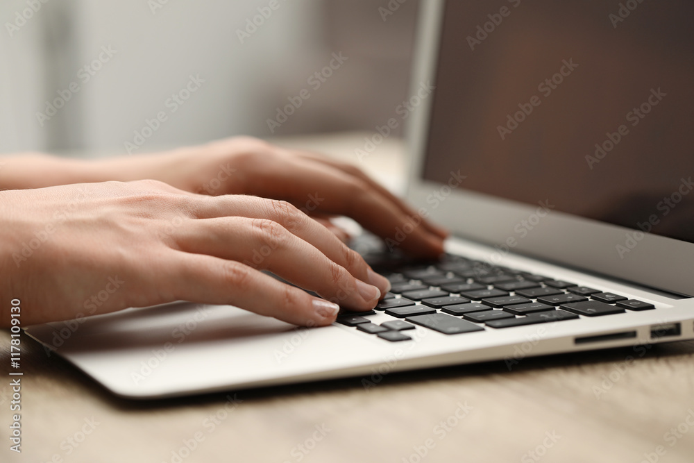 Businessman using laptop at table, closeup. Modern technology Businessman using laptop at table, closeup. Modern technology