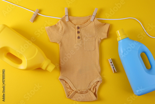 Adorable Baby Onesie set complete with Detergent and a Toy specifically designed for Laundry