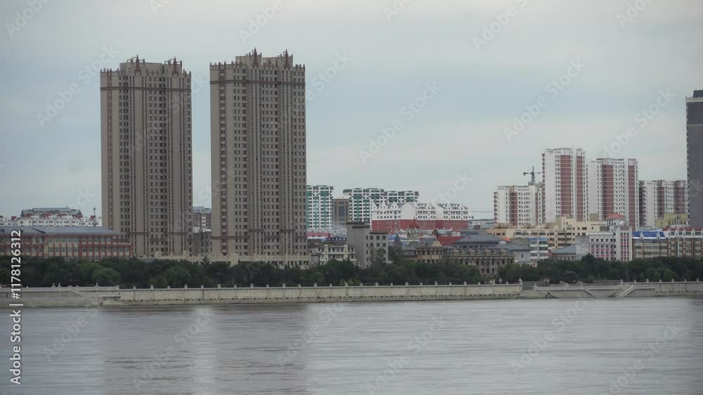 August 29, 2020 - Blagoveshchensk, Russia - View from the Blagoveshchenskaya embankment to the Chinese city of Heihe. August 29, 2020 - Blagoveshchensk, Russia - View from the Blagoveshchenskaya embankment to the Chinese city of Heihe.