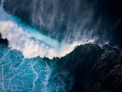 Top down aerial view of moody blue ocean wave photo