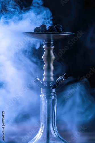 Close up on hookah for vaping. Ceramic hookah bowl with hot coals and smoke on colored abstract background with copy space, banner template photo