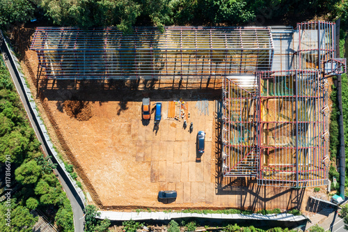 Aerial View of Active Construction Site with Metal Framework photo