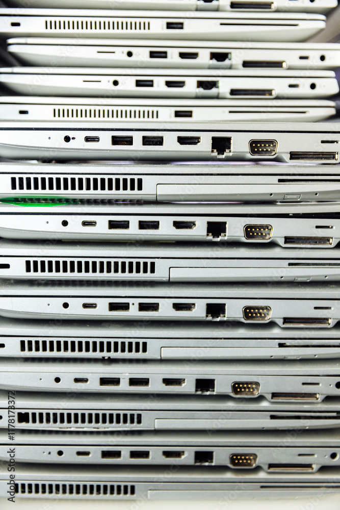 Broken old laptops stacked Broken old laptops stacked