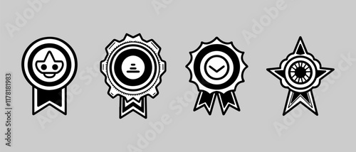 Collection of four award badges with distinct designs on a light gray background