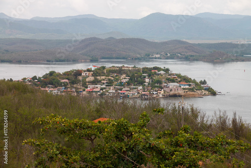 Cayo Granma Island with a fishing community in Santiago de Cuba bay photo