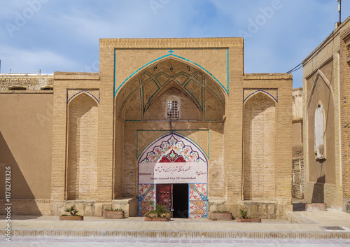 Entrance to the ancient underground city of Ouyi in Noushabad, Iran (near Kashan). Descent down begins immediately after the black opening photo