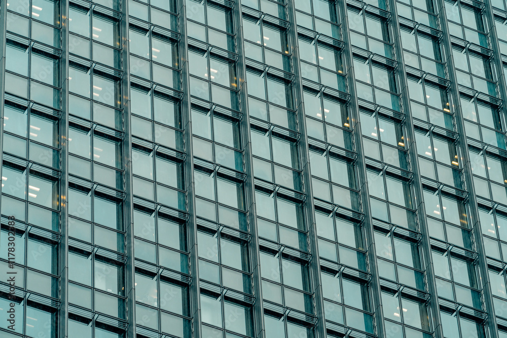 Architecture and real estate, residential apartment building with large panoramic windows, modern complex, angle view. Architecture and real estate, residential apartment building with large panoramic windows, modern complex, angle view.