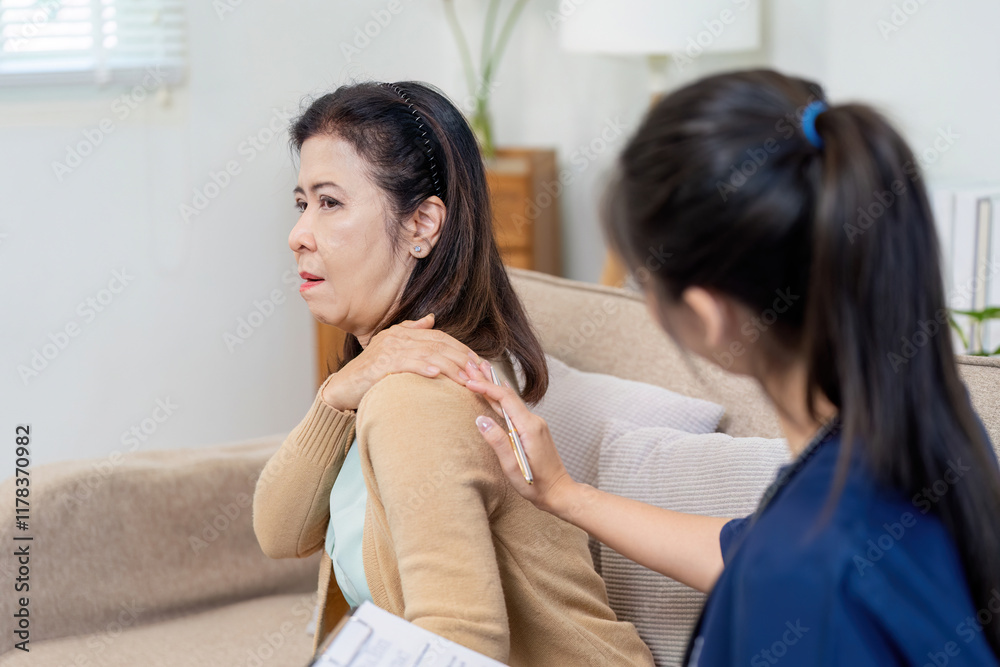 Caregiver checks symptoms of elderly patient with doctor in a cozy home environment Caregiver checks symptoms of elderly patient with doctor in a cozy home environment
