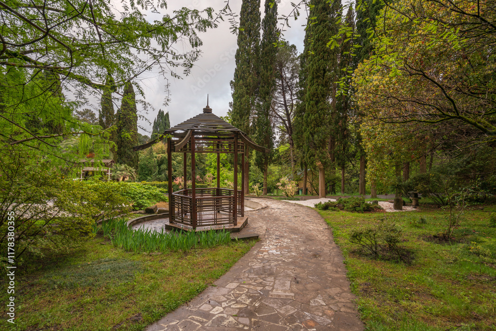 View of the Japanese garden with a wooden gazebo in the Upper Park of the Sochi Arboretum, Sochi, Krasnodar Territory, Russia View of the Japanese garden with a wooden gazebo in the Upper Park of the Sochi Arboretum, Sochi, Krasnodar Territory, Russia