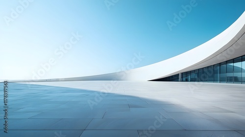 Sleek Modern Architectural Masterpiece Against Clear Blue Sky with Empty Concrete Floor