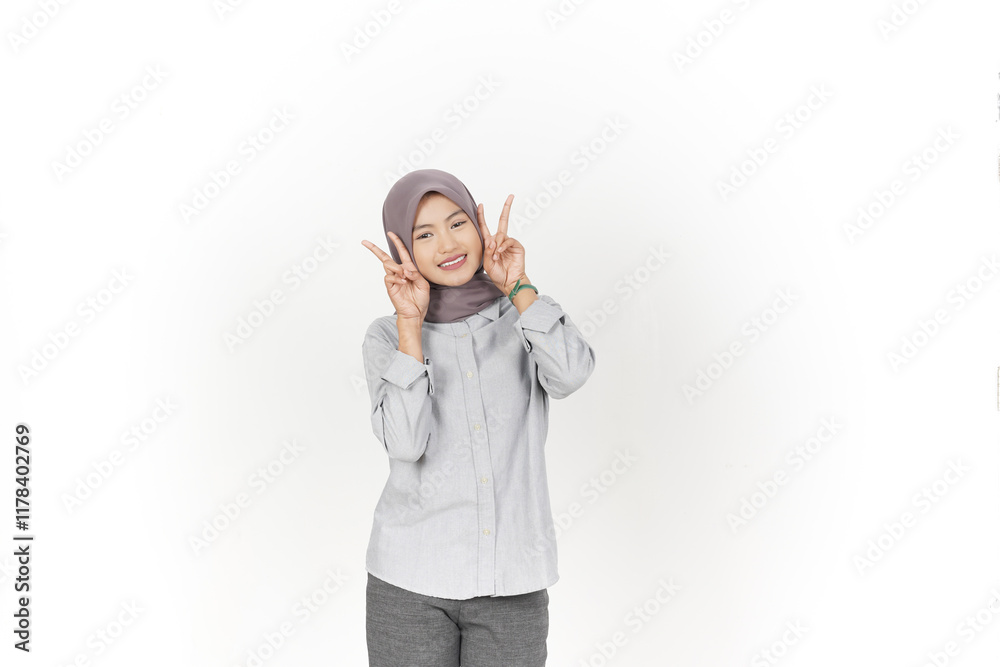 Showing Peace or Victory Sign Of Beautiful Asian Woman wearing hijab Isolated On White Background Showing Peace or Victory Sign Of Beautiful Asian Woman wearing hijab Isolated On White Background
