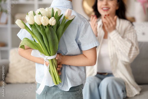Cute little boy with tulips...