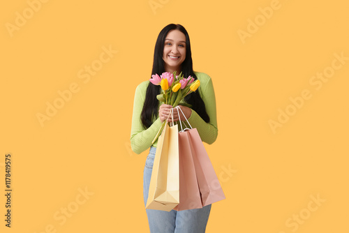 Happy woman with shopping b...