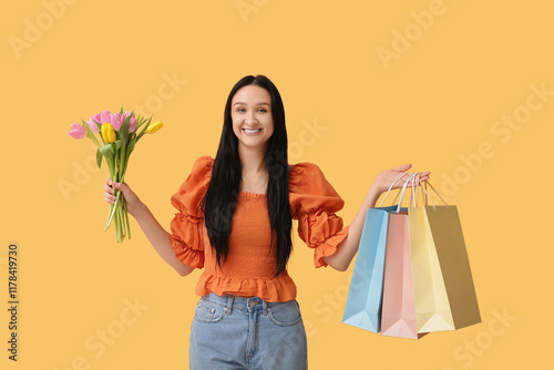 Happy woman with shopping b...
