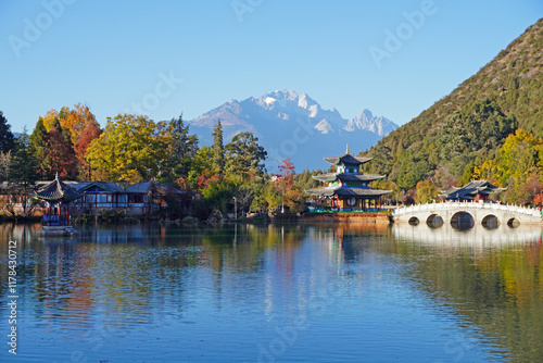 Black dragon pool in Lijiang Ancient Town with best views of Jade Dragon Snow Mountain. Famous travelling destination in Yunnan province, China photo