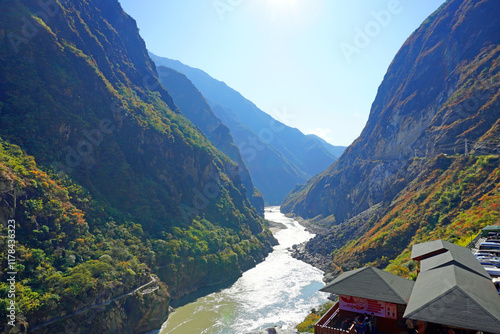 Tiger Leaping Gorge is a scenic canyon on the Jinsha River, a primary tributary of the upper Yangtze River, Lijiang City, Yunnan China photo