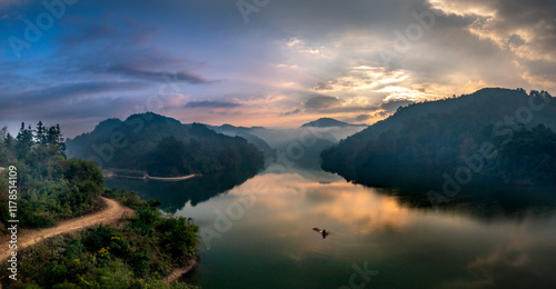 Fototapeta Naklejka Na Ścianę i Meble -  Sunrise on Ban Viet Lake in Cao Bang Province, Vietnam