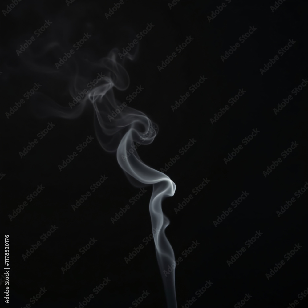 Thin lines of smoke rising against a pitch-black background Thin lines of smoke rising against a pitch-black background