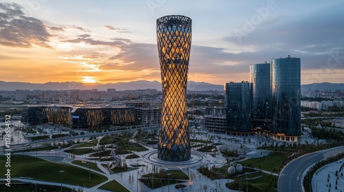 Stunning sunset over bayterek tower in nursultan architecture photography urban landscape aerial view serenity photo