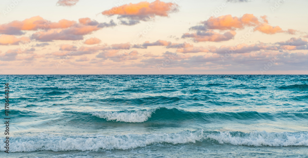 Obraz premium Sea horizon view. Cloudy sky and seascape at summer vacation. Skyscape with sea horizon. Calm horizon view at sea sunrise. Romantic summer vacation sunrise on seascape. Distant sea horizon