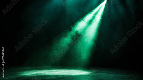 beautiful, A spotlight shines on the dark stage, with green light shining down from above. The beam of light is very strong and bright. There's nothing in front of it. A dark background. photo