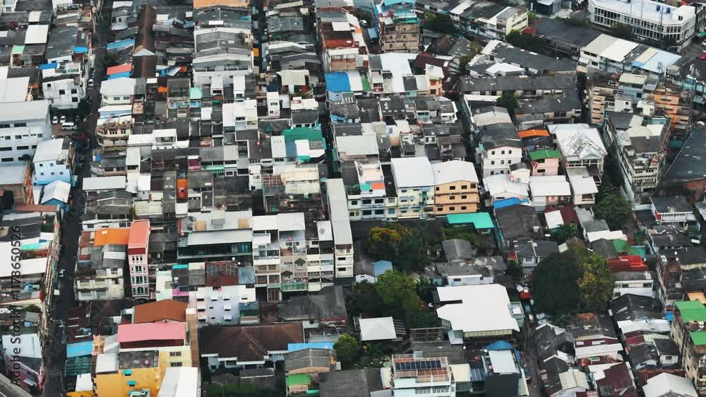 Aerial view of the Bangkok slums with low-rise buildings in the old city district Aerial view of the Bangkok slums with low-rise buildings in the old city district