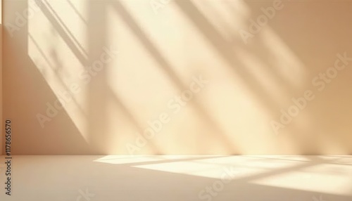 A soft beige studio with delicate natural shadows  ideal for beauty product photography.