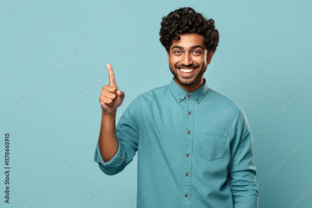 Indian man pointing smiling finger. Indian man pointing smiling finger.