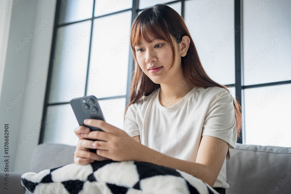 Asian woman using smartphone texting message browsing information