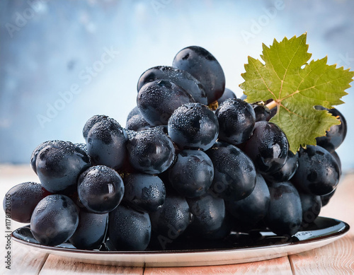 A grape is a fruit, botanically a berry, of the deciduous woody vines of the flowering plant genus Vitis.