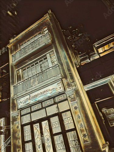 A pen and wash illustration featuring a old style building with balcony in the city in dark night.