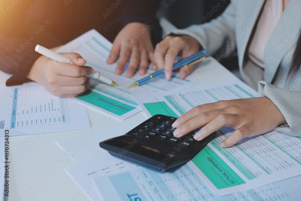 Team of business people are meeting to analyze data for marketing plan,Market research reports and income statistics, Financial and Accounting concept. Team of business people are meeting to analyze data for marketing plan,Market research reports and income statistics, Financial and Accounting concept.