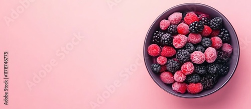 Bowl of Ice Cream with Berries on Pink Background Ideal for Summer Dessert Promotions or Cafe Menus photo