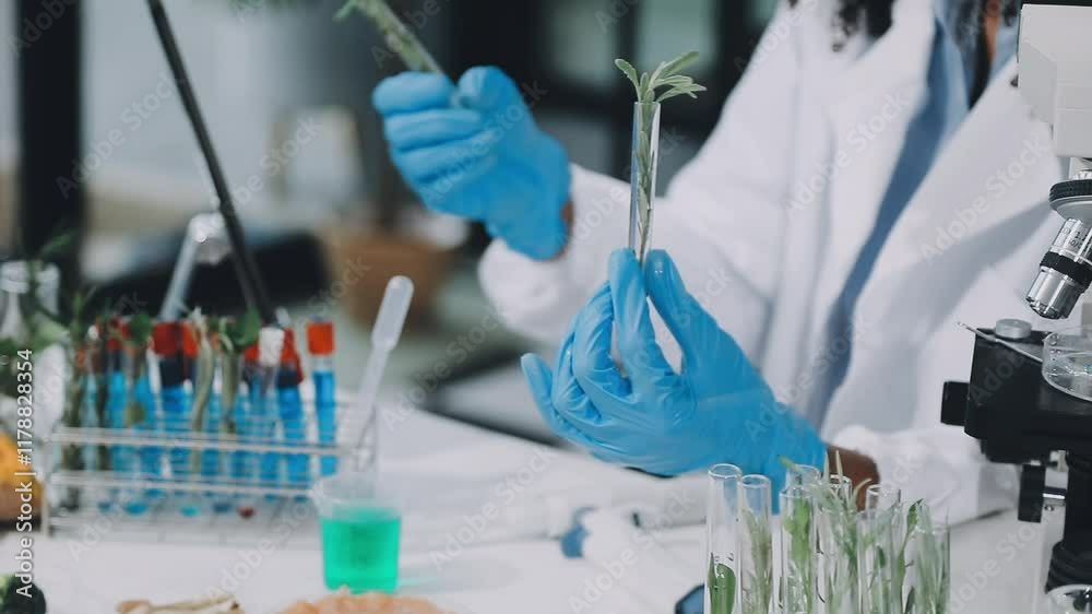 Food scientists in lab coats, testing samples, and analyzing food safety and quality in a modern laboratory environment.